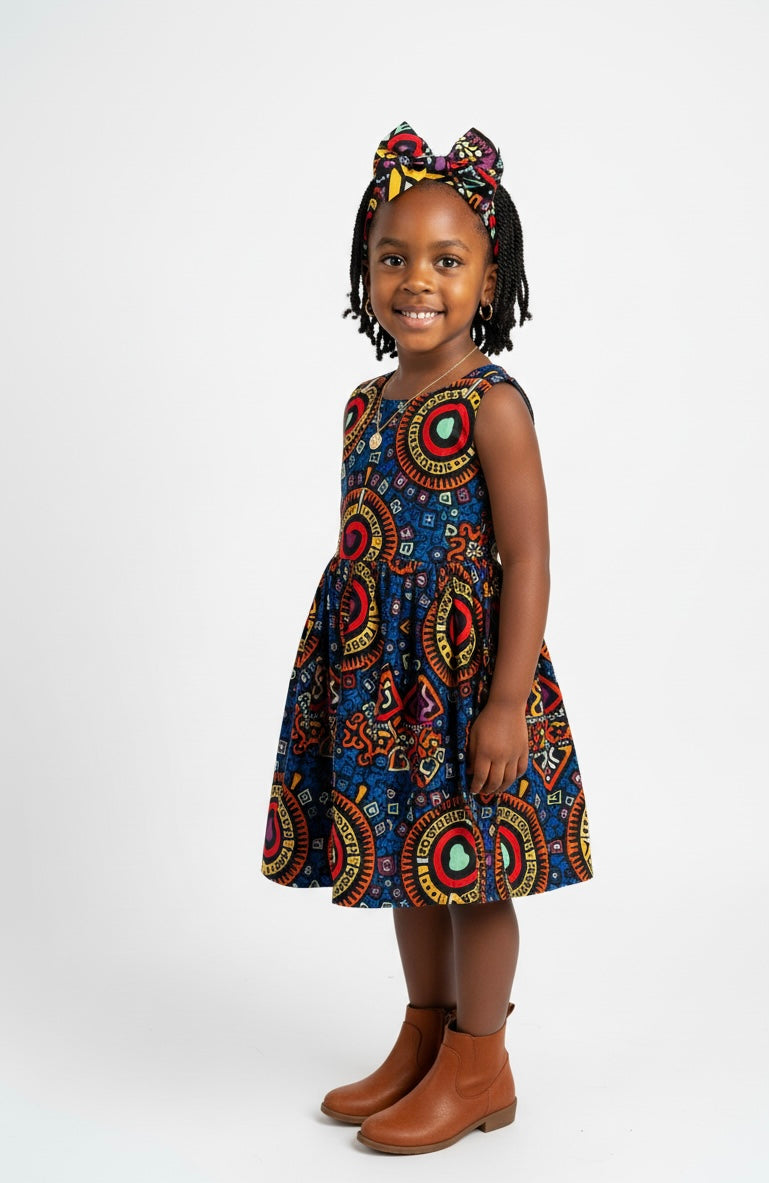 Bandeau fillette en tissu wax, confortable et élégant, parfait pour toutes occasions.