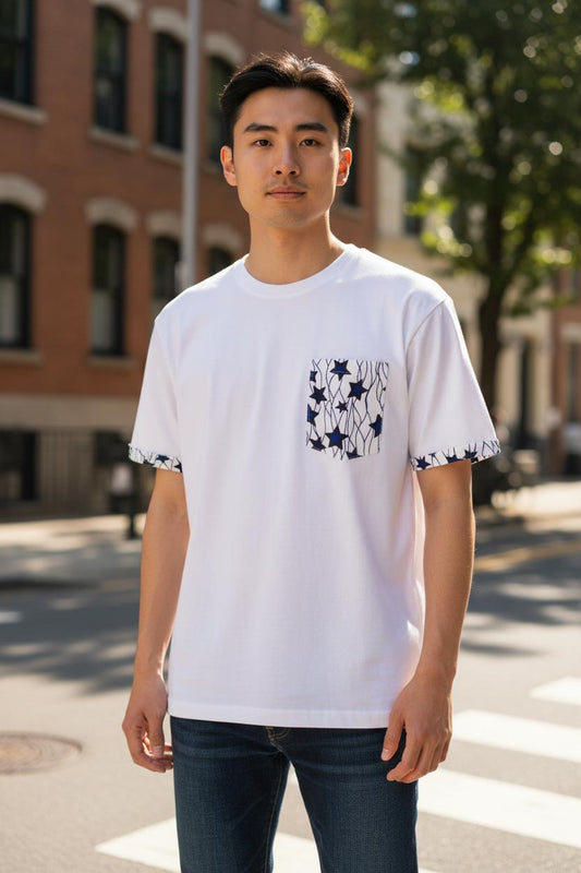 T-shirt mixte Ngando blanc avec poche en Wax et bordure Wax faite main, modèle unisexe en coton.