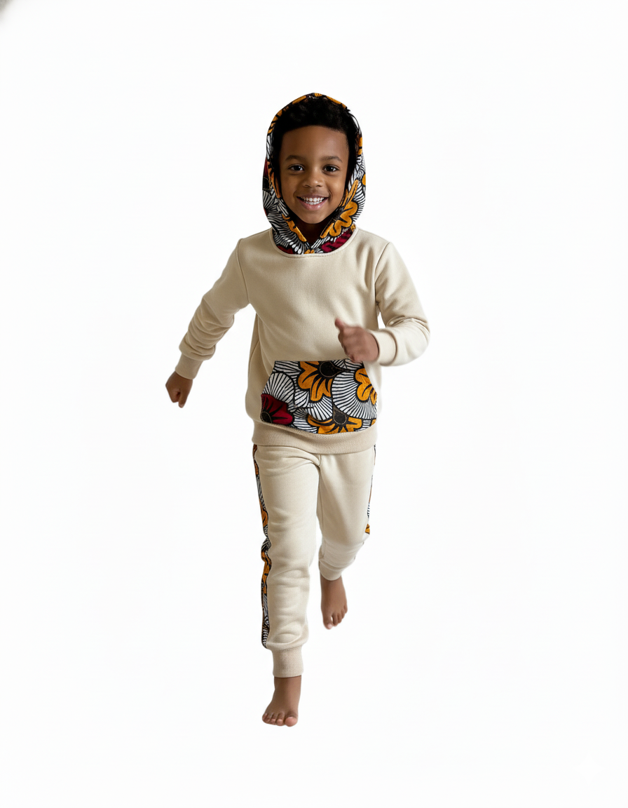 Jogging enfant afro moderne MPESA, vêtement mixte confortable 65 % coton 35 % polyester avec détails en wax fait main, idéal pour filles et garçons.